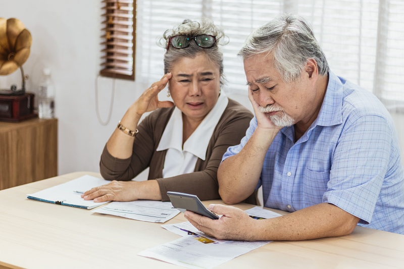elderly couple reviewing unpaid taxes and ssi income