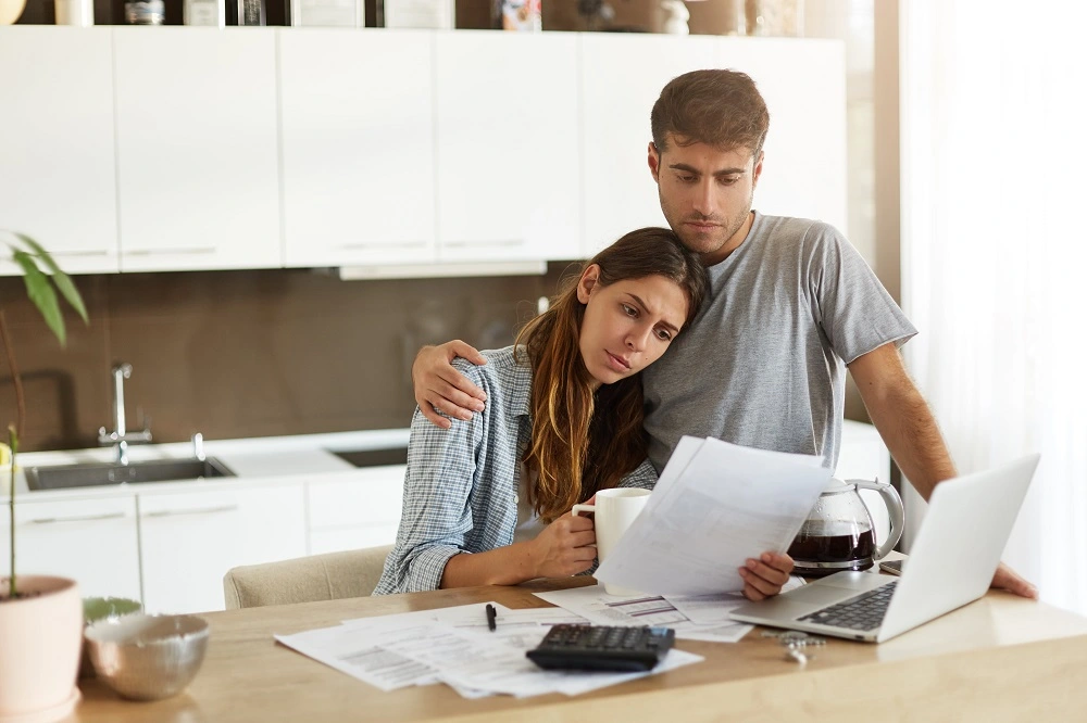 couple reading important tax document