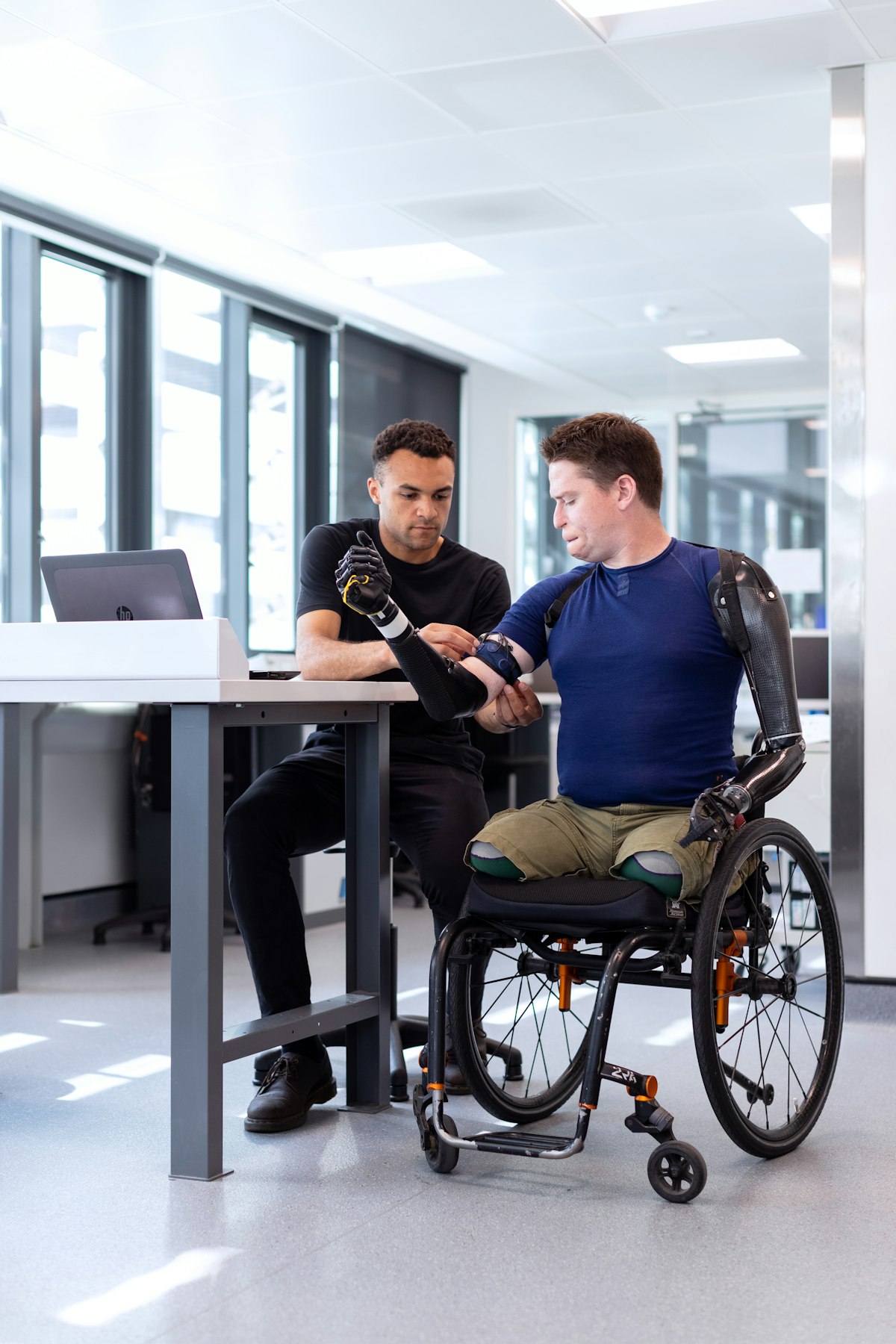 Man working at an accessible workspace