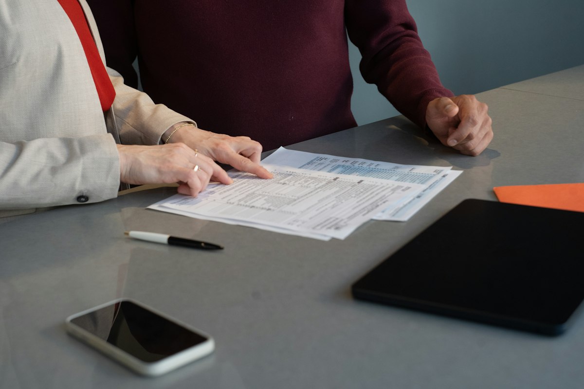Couple reviewing tax documents together