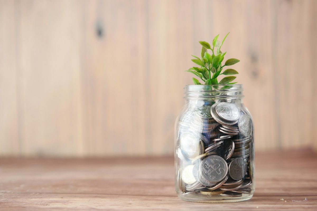 Retirement savings jar filled with coins